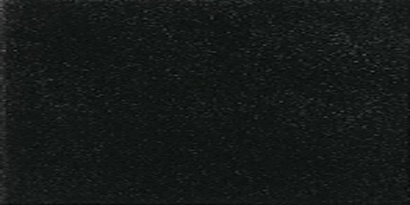 Dettaglio piastrella in gres porcellanato effetto tinta unita opaco antiscivolo della collezione Landscape di Casalgrande, formato 12,5x25 cm, colore Lava