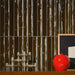 Dettaglio rivestimento in gres porcellanato serie Milano70 di 41zero42, effetto mattoncino lucido bamboo, formato 4x31 cm, Colore Bamboo Cacao