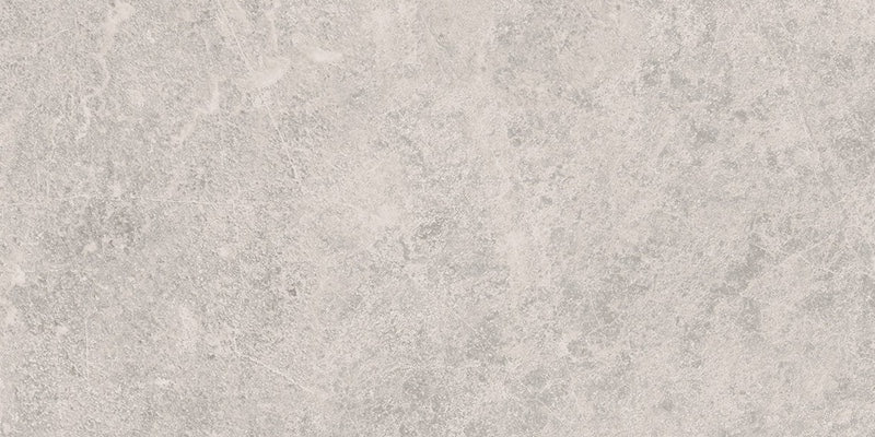 Dettaglio piastrella da pavimento e rivestimento in gres porcellanato effetto pietra naturale della collezione Origini di Gardenia Orchidea, formato 30x60, colore Crux White