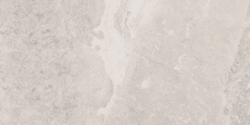 Dettaglio piastrella da pavimento e rivestimento in gres porcellanato effetto pietra naturale della collezione Origini di Gardenia Orchidea, formato 30x60, colore Crux White