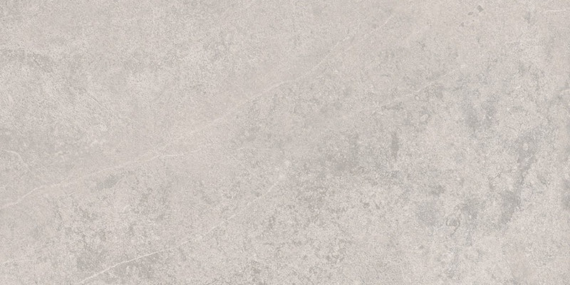 Dettaglio piastrella da pavimento e rivestimento in gres porcellanato effetto pietra naturale della collezione Origini di Gardenia Orchidea, formato 30x60, colore Crux White