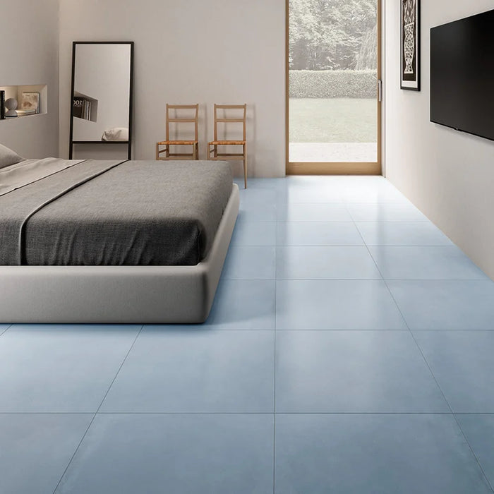 Dettaglio piastrella in gres porcellanato effetto cemento nuvolato della collezione R-Evolution di Casalgrande, formato 60x60 cm, colore Azure