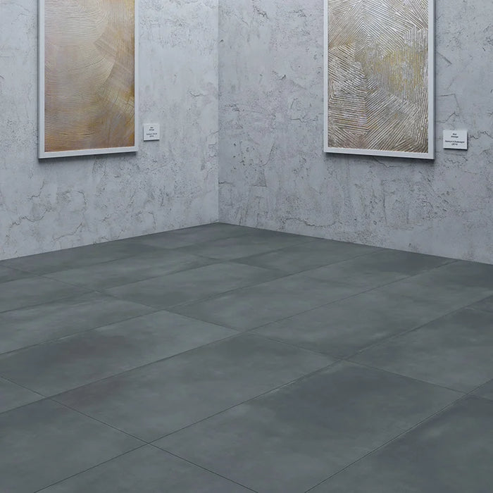 Dettaglio piastrella in gres porcellanato effetto cemento nuvolato della collezione R-Evolution di Casalgrande, formato 60x120 cm, colore Dark Grey