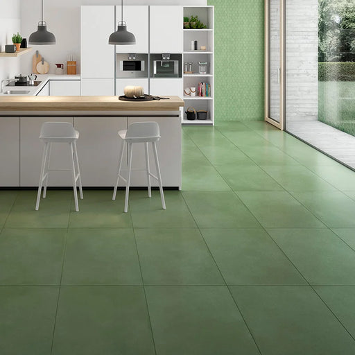 Dettaglio piastrella in gres porcellanato effetto cemento nuvolato della collezione R-Evolution di Casalgrande, formato 60x120 cm, colore Green