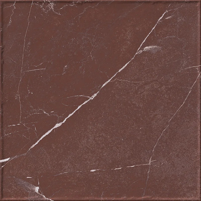 Dettaglio piastrella in gres porcellanato effetto marmo della collezione Dama di Self Style by keradom, formato 25x25, colore Rosso Cardinale