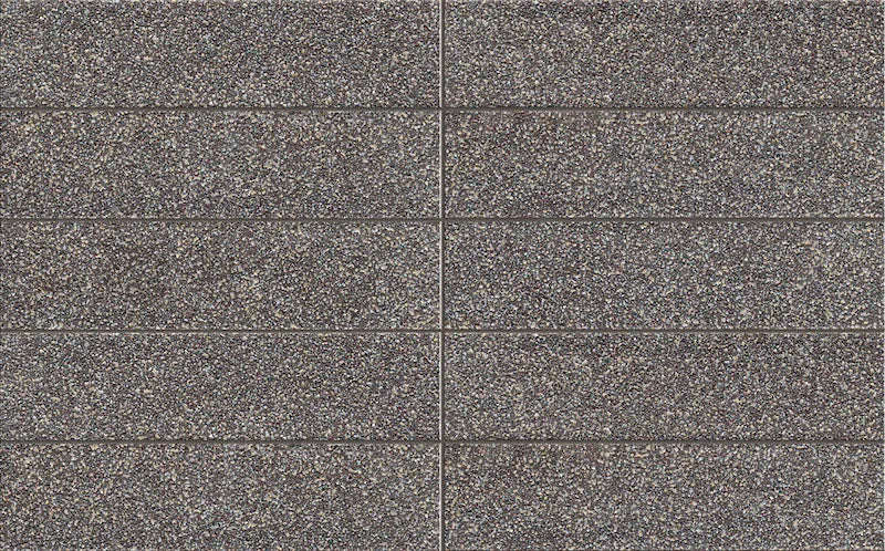 Dettaglio piastrella in gres porcellanato effetto mattoncino effetto graniglia della collezione Incanto di Self Style by keradom, formato 6x25, colore Grani Bold