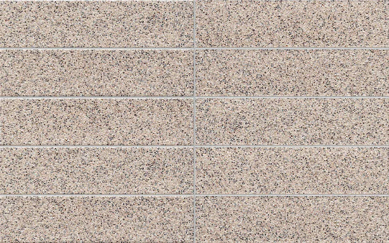 Dettaglio piastrella in gres porcellanato effetto mattoncino effetto graniglia della collezione Incanto di Self Style by keradom, formato 6x25, colore Grani Medium