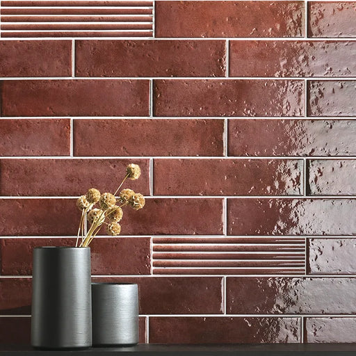Dettaglio piastrella per rivestimento in gres porcellanato effetto mattoncino lucido Brick 7,5x30 cm della collezione Oxida, colore Red di Ceramica Settecento