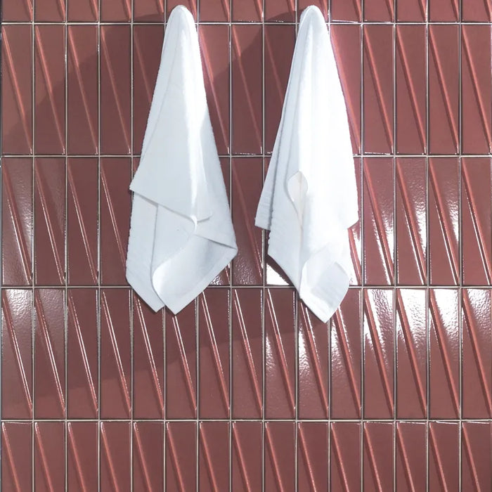 Dettaglio piastrella per rivestimento in ceramica effetto mattoncino Lucido 7,6x30,5 cm della collezione Pulse, colore Ruby di Ceramica Settecento