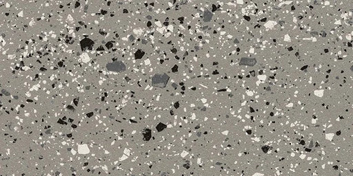 Dettaglio piastrella in gres porcellanato effetto graniglia e marmetta della Collezione terrazzotech di Casalgrande, formato 30x60 cm, colore Grigio