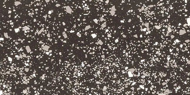 Dettaglio piastrella in gres porcellanato effetto graniglia e marmetta della Collezione terrazzotech di Casalgrande, formato 30x60 cm, colore Nero