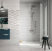 Ambientazione bagno con rivestimento effetto travertino grigio. serie marvel di idea ceramica