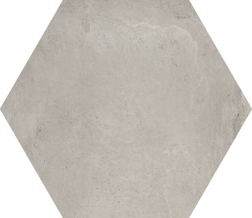 Dettaglio piastrella in gres porcellanato effetto cemento esagonale. Collezione Domus di Savoia Ceramiche, Colore Grigio formato 40x35